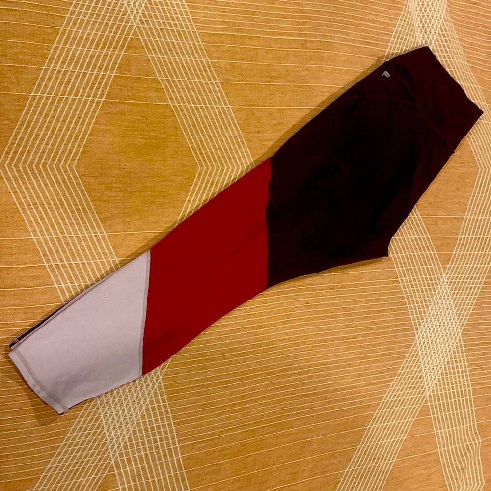 Powerhold Fabletics pants, size large, tri-color maroon,cranberry, pink.